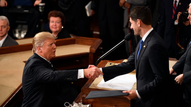 President Trump enters the chamber before addressing a joint session of Congress on Feb. 28, 2017.