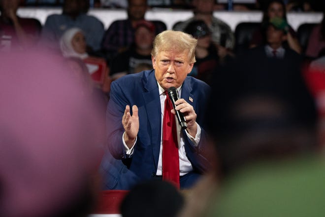 Former president Donald Trump speaks to an audience during a town hall meeting at Dort Financial Center in Flint, Michigan on Tuesday, September 17, 2024.