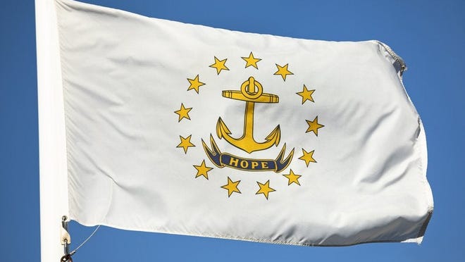 The Rhode Island state flag in front of a blue sky.