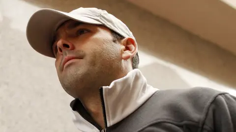 Solarpix Daniel Kinahan wearing a baseball cap