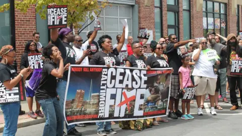 BBC Ceasfire marchers move through downtown Baltimore