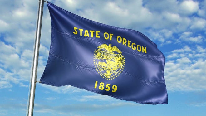 Oregon's flag is the only state flag in the country that has different designs on each side — the escutcheon from the state seal on one and a gold figure of a beaver on the other.