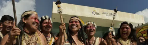 Getty Images Nemonte Nenquimo (centre), celebrates with other Waorani after a court ruled in their favour in Puro, Ecuador, on April 26, 2019