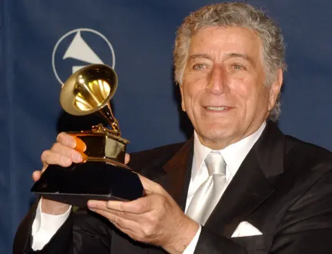 PA Media File photo dated 23/02/03 of Tony Bennett with the Best Traditional Pop Vocal Album award at the 45th Annual Grammy Awards at Madison Square Garden in New York, US, as the American singer has died aged 96. Issue date: Friday July 21, 2023.