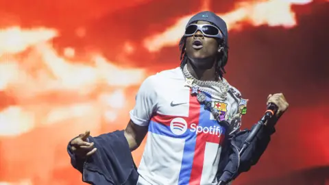 Getty Images Nigerian rapper Rema performs at a concert in Barcelona, Spain - 1 June 2023