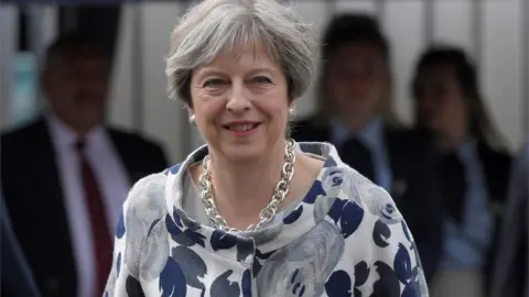 Reuters Theresa May