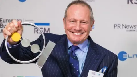 True Potential David Harrison with his European Business Award