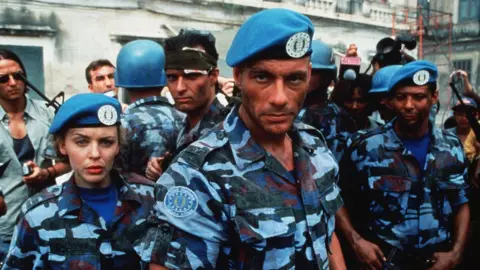 Shutterstock Kylie Minogue and Jean-Claude Van Damme