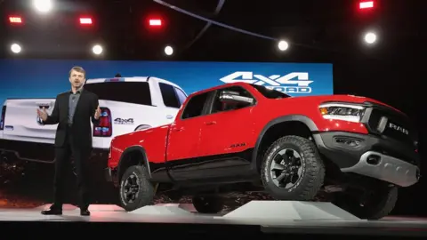 Getty Images Mike Manley, head of Ram brand at Fiat Chrysler Automobiles (FCA), introduces the 2019 Ram 1500 Rebel pickup truck at the North American International Auto Show (NAIAS) on January 15, 2018 in Detroit, Michigan