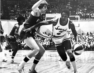 George Carter, right, played in the ABA for seven seasons.