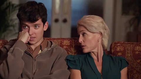 Netflix In Sex Education, Otis (Asa Butterfield) plays a teen whose mother (Gillian Anderson) is a sex therapist (Credit: Netflix)