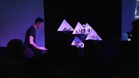 Getty Images Algorithms even extend to raves, in which DJs compose music algorithmically in real time – such as Moritz Simon Geist, pictured at the 2019 SXSW festival (Credit: Getty Images)