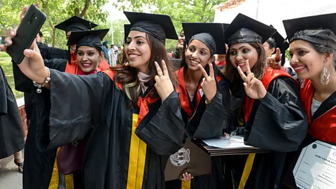 Getty Images Doctor of Philosophy graduates in Amritsar, India in 2019. Around the world, university degrees are still valued, but online learning could be changing that (Credit: Getty Images)