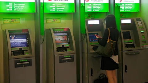 Alamy In Hong Kong's romance scams, women are often nudged to transfer cash to their 'boyfriends' (Credit: Alamy)