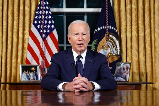 US President Joe Biden addresses the nation on the conflict between Israel and Gaza and the Russian invasion of Ukraine from the Oval Office of the White House in Washington, DC, on October 19, 2023. President Joe Biden will deliver a rare Oval Office speech October 19, 2023 urging Americans to back military aid for Israel and Ukraine at what he calls a perilous moment for democracy around the globe.