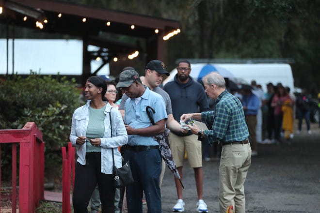 Voters line up as the polls open at 7 a.m. on Election Day on Nov. 5, 2024, at the VFW Post 660 in Garden City, Ga.