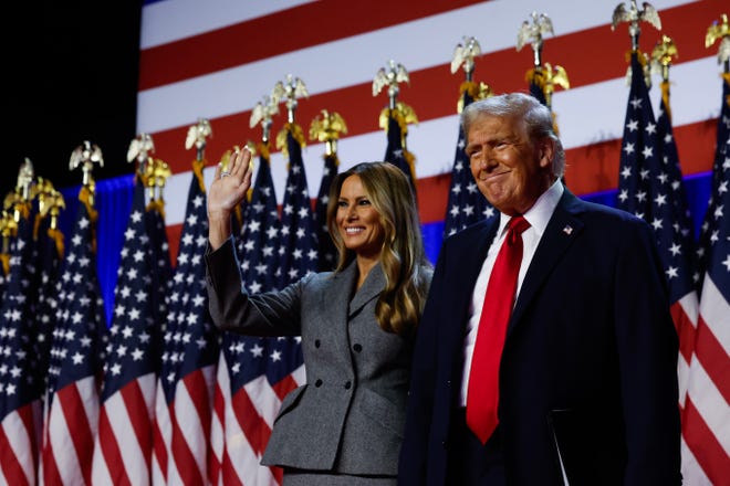 President-elect Donald Trump arrives to speak with former first lady Melania Trump during an election night event at the Palm Beach Convention Center on Nov. 6, 2024 in West Palm Beach, Fla.