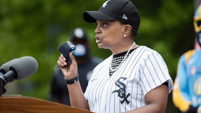 Chicago Mayor Lori Lightfoot speaks during a news conference at the Guaranteed Rate Field, home of the White Sox. Lightfoot launched an awareness campaign called "We Are All One Team" that encourages young people to wear masks, maintain social distance and stop gathering in large groups to help prevent the spread of COVID-19.