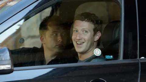Getty Images Drew Houston in a car with Mark Zuckerberg