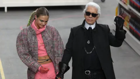 Getty Images Cara Delevingne and Karl Lagerfeld