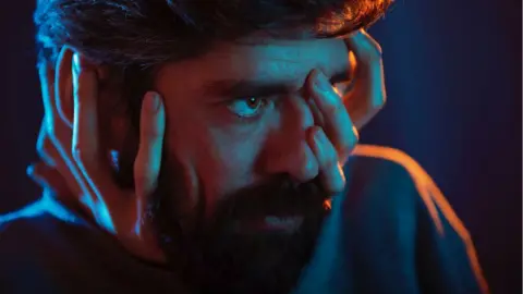 Alberto Morago Shot of Javier Botet with his hands on his face