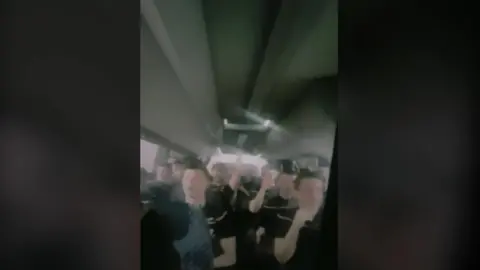 TYRONE PLAYERS ON BUS