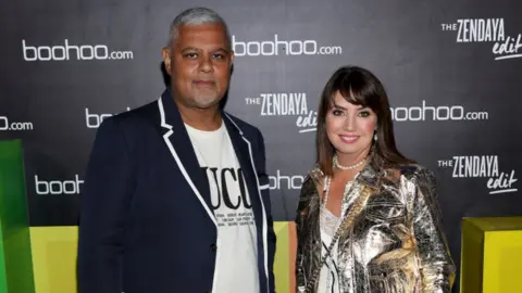 Getty Images Mahmud Kamani and Carol Kane