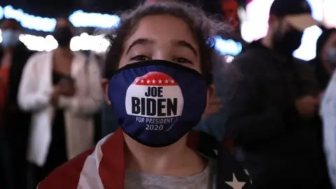 EPA Biden supporter Elise, nine, in New York