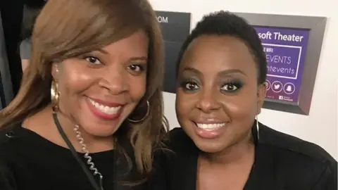 Melanie Walton (left) with singer Ledisi Melanie Walton