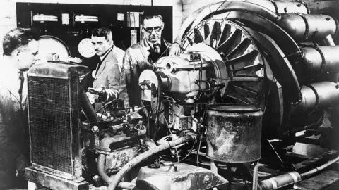 Getty Images A scene showing Whittle and colleagues testing the first engine was recreated for the official film 'Jet Propulsion' made by the Crown Film Unit using the old testbed