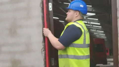 Luke Emery Luke on a construction site