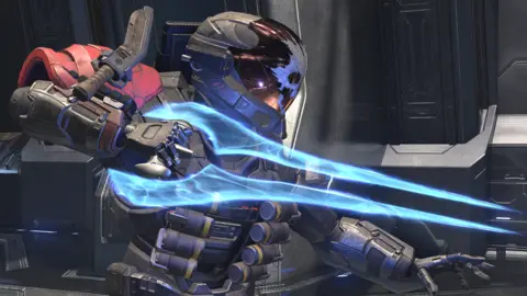 Microsoft A Halo Spartan character lunges with an energy sword