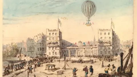 G Miles print of a hot air balloon floating over buildings and a square in 1800s Europe