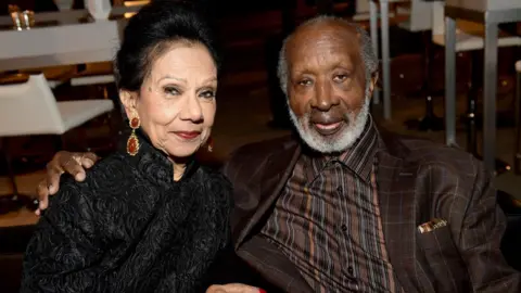 Getty Images Clarence Avant with his wife Jacqueline