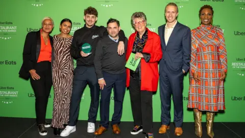 Uber Eats Sandwich Sandwich team receiving award