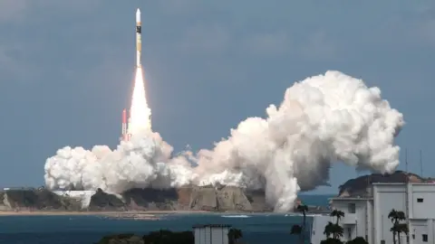 Getty Images Japan's H-2A rocket blasting off