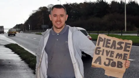The Scottish Sun Nathan Campbell standing at the side of A77