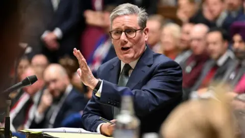 House of Commons via REUTERS Sir Keir Starmer at the ballot box