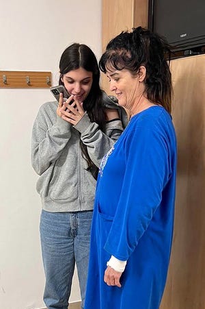 Natalie Shoshana Raanan and Judith Tai Raanan speaking on the phone with U.S. President Joe Biden on Oct. 20, 2023, after being held hostage by Hamas.