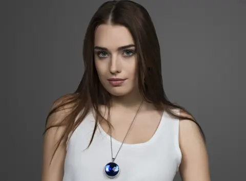 Safer Woman wearing Safer pendant