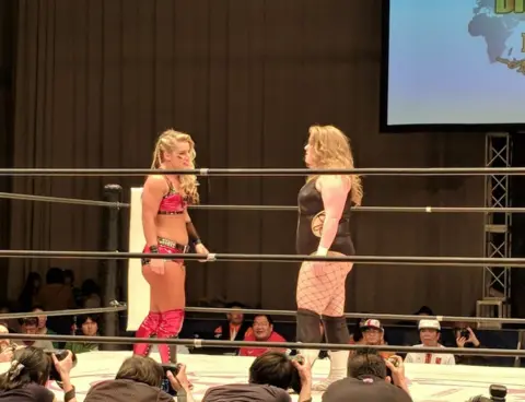 Raise The Roof/BBC Away from the ring, wrestlers Viper and Toni Storm are great friends, but there are no holds barred on fight day with a double world title up for grabs in Japan