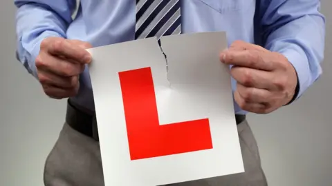Getty Images Man with a learner plate