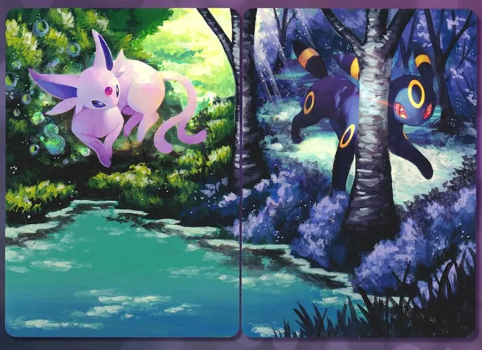 @Lunumbra/The Pokemon Company The Umbreon and Espeon cards repainted. The artwork now extends to cover the entire cards, creating a scenic day and night painting with a forest and lake.