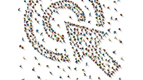 Getty Images People forming arrow shape