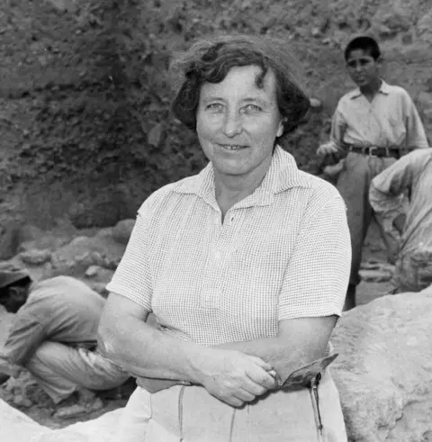 Getty Images Archaeologist Kathleen Kenyon excavating a site in Jericho.
