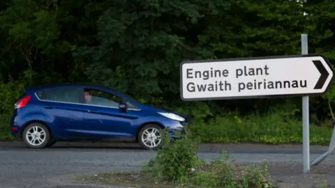 Getty Images A Ford Fiesta next to the road sign for Bridgend Ford