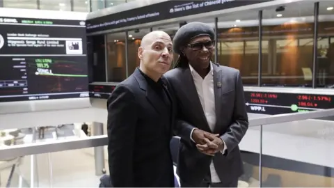 LAYTON THOMPSON Merck Mercuriadis and Nile Rodgers at the London Stock Exchange