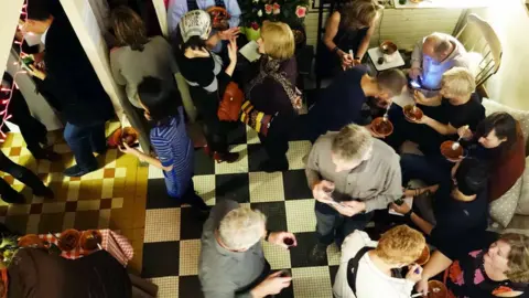 Michael Kurcfeld Jim Haynes' Paris dinners as seen from the mezzanine above