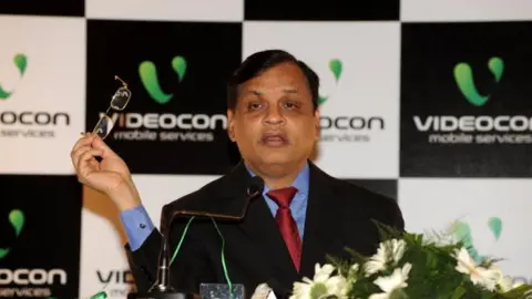 Getty Images Dhoot during the launch of the Videocon GSM Mobile Service in Ahmedabad in April 2010