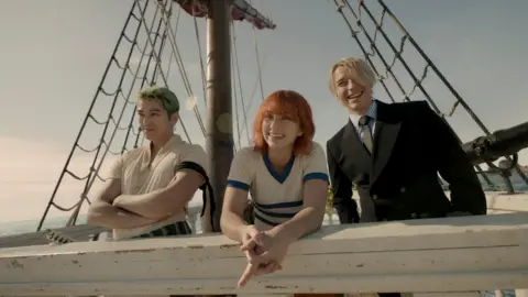 Netflix Characters appear on pirate ship.
